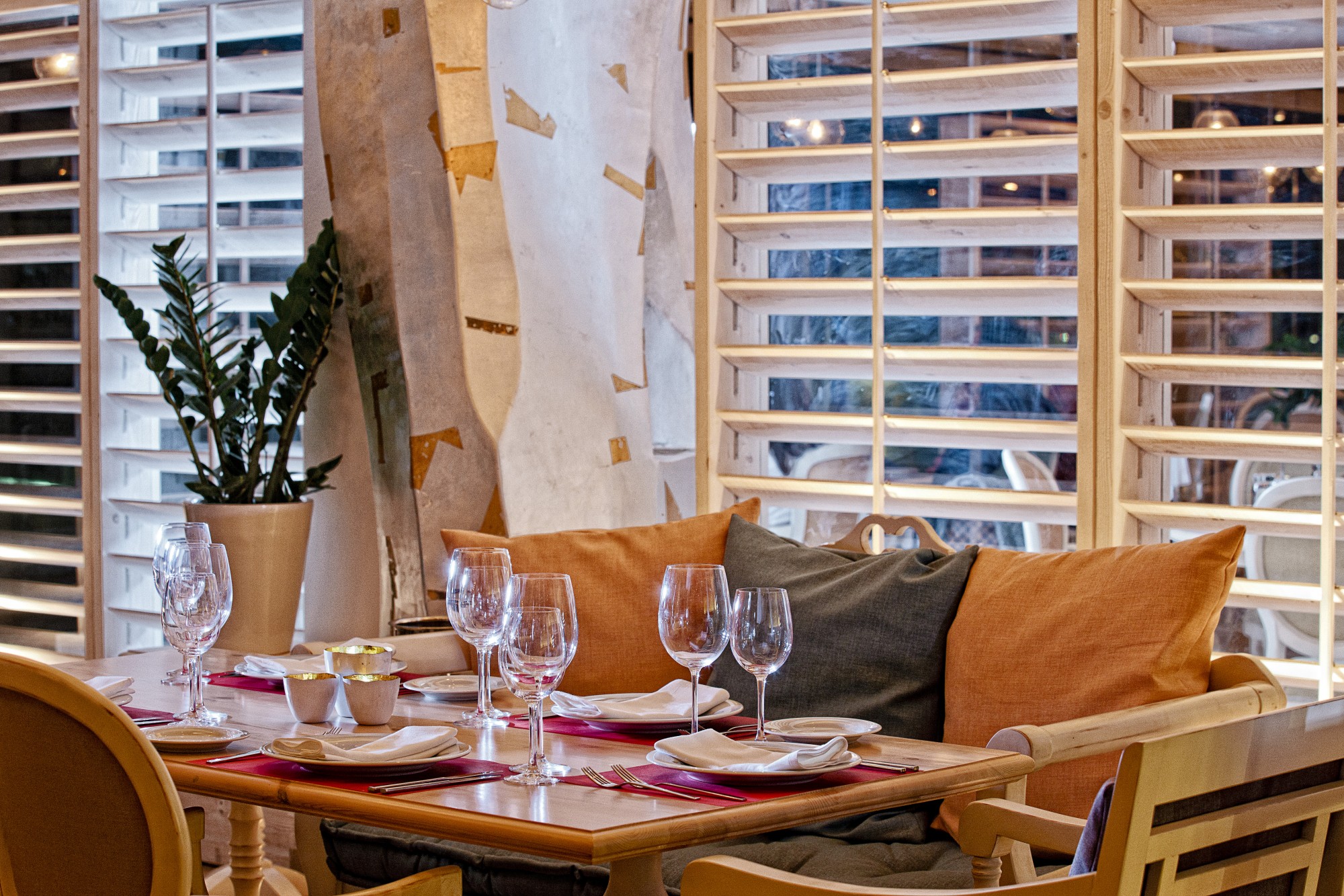 Knossos Beach decorated lunch table with couch