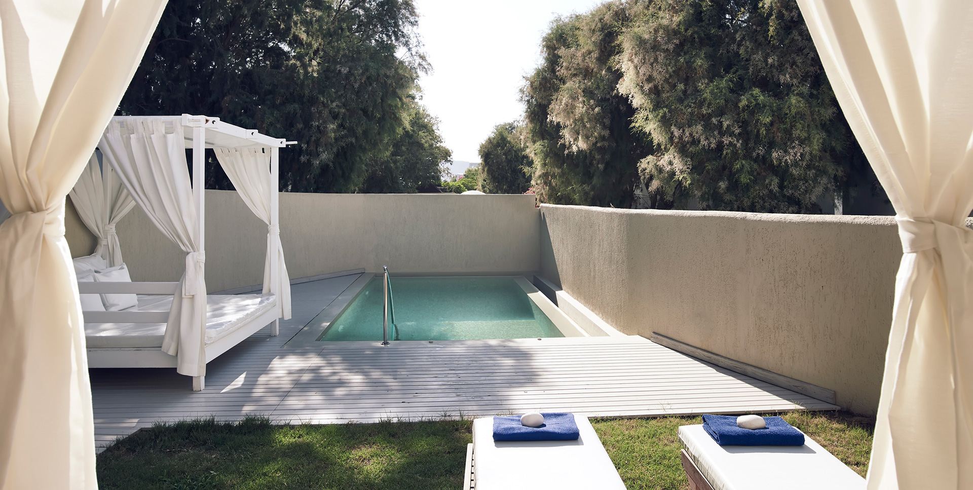 Knossos Beach Two Bedroom Spa Suite Sea View Private Pool terrace with pool, sunbeds and a gazebo